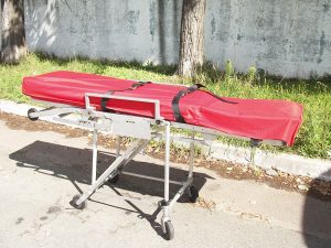 Перевезення лежачих хворих по Києу з травмою хребта на каталці